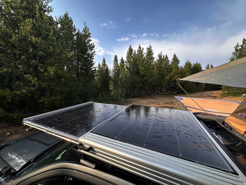Solar panel on vehicle while camping